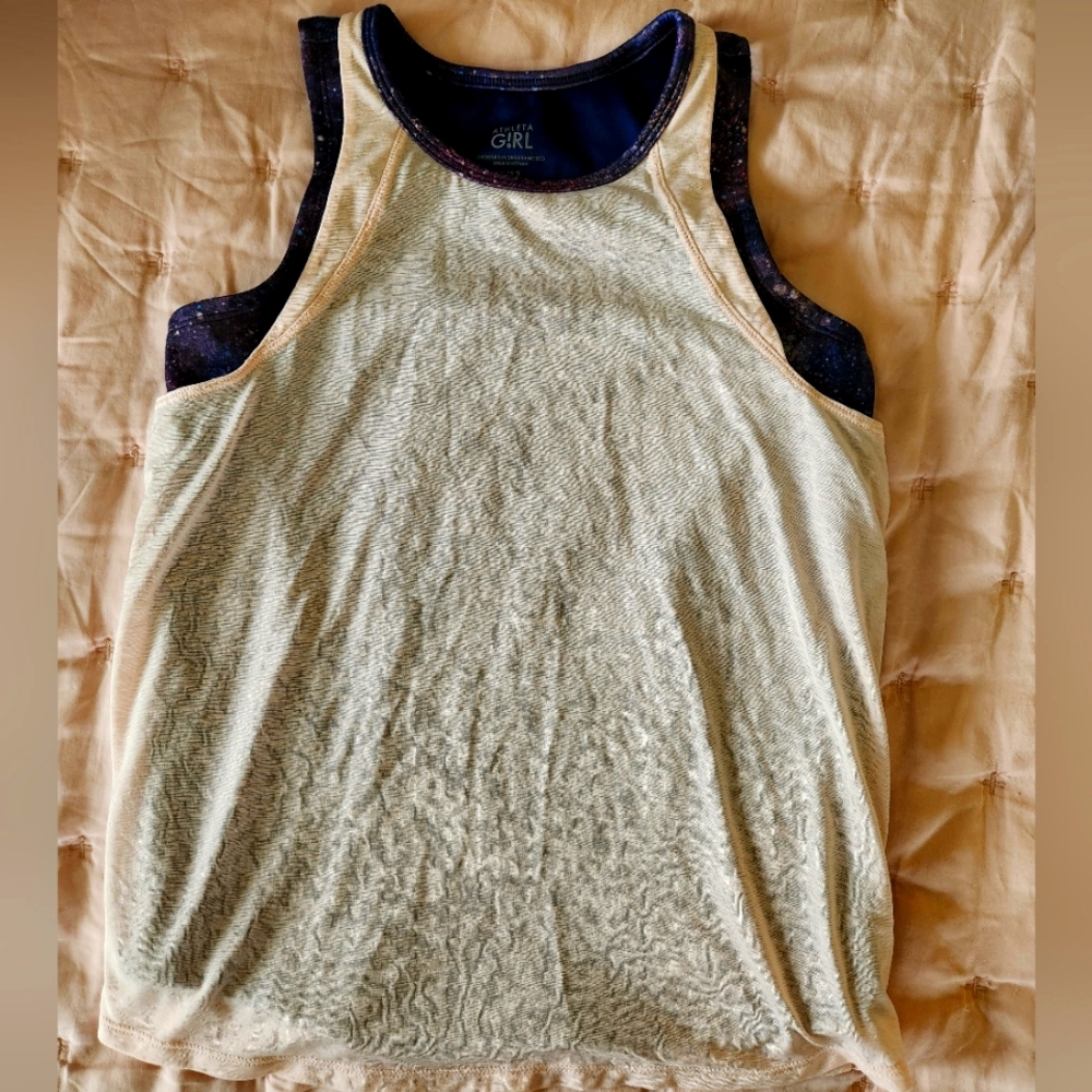 Athleta Girl layered pink and purple performance tee.